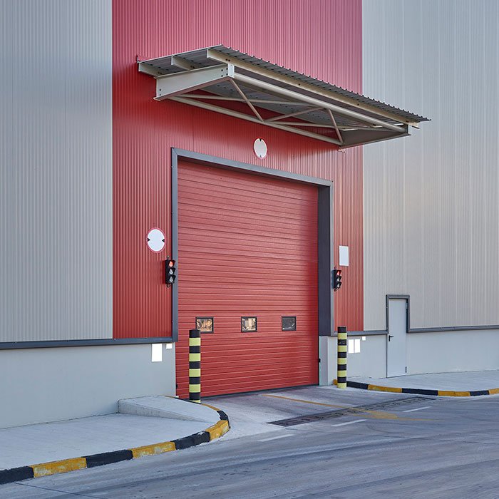 porte sectionnelle rouge – installation portes de garage & volets Bruxelles